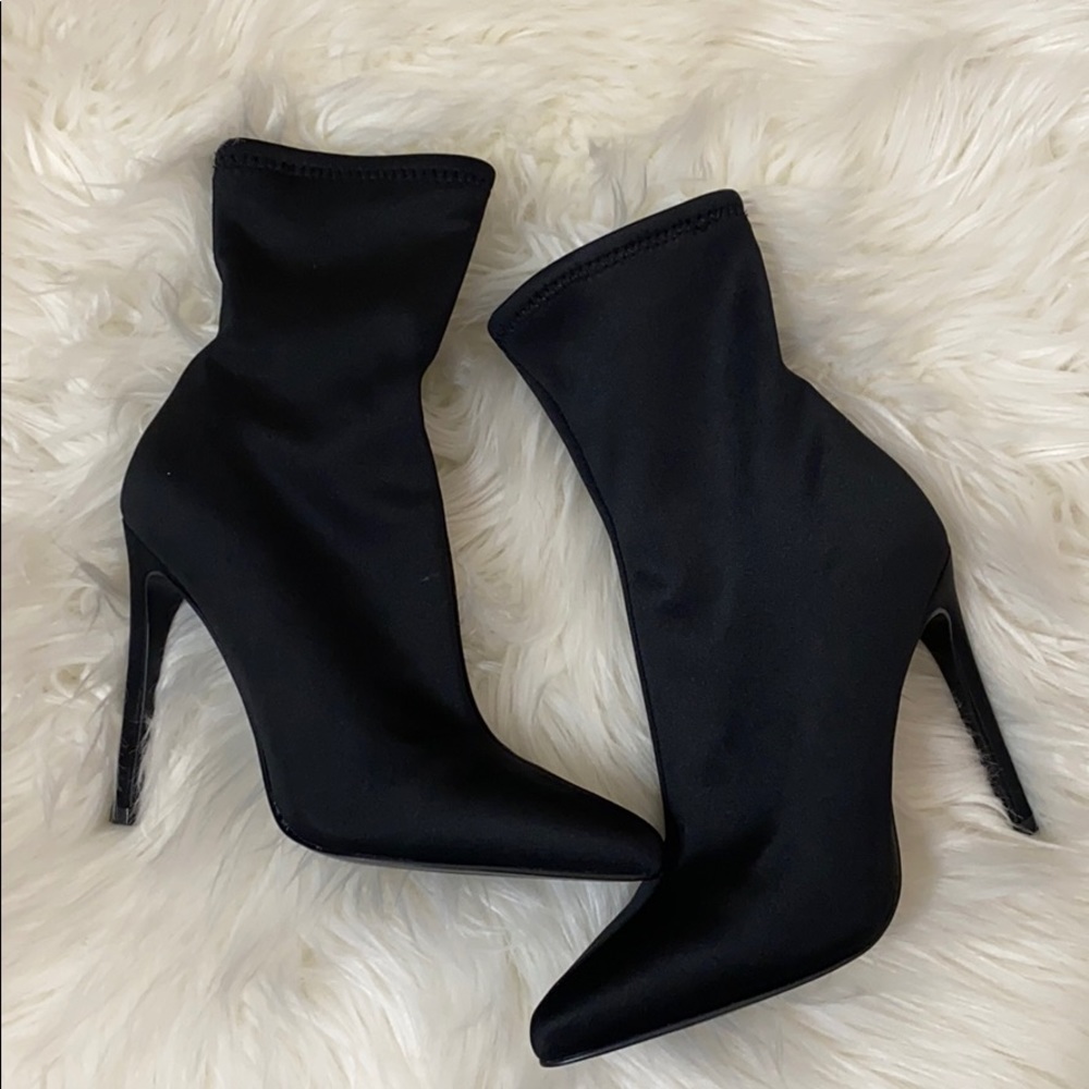 Steve Madden “ Lovely Black”  Sock Stretch Booties